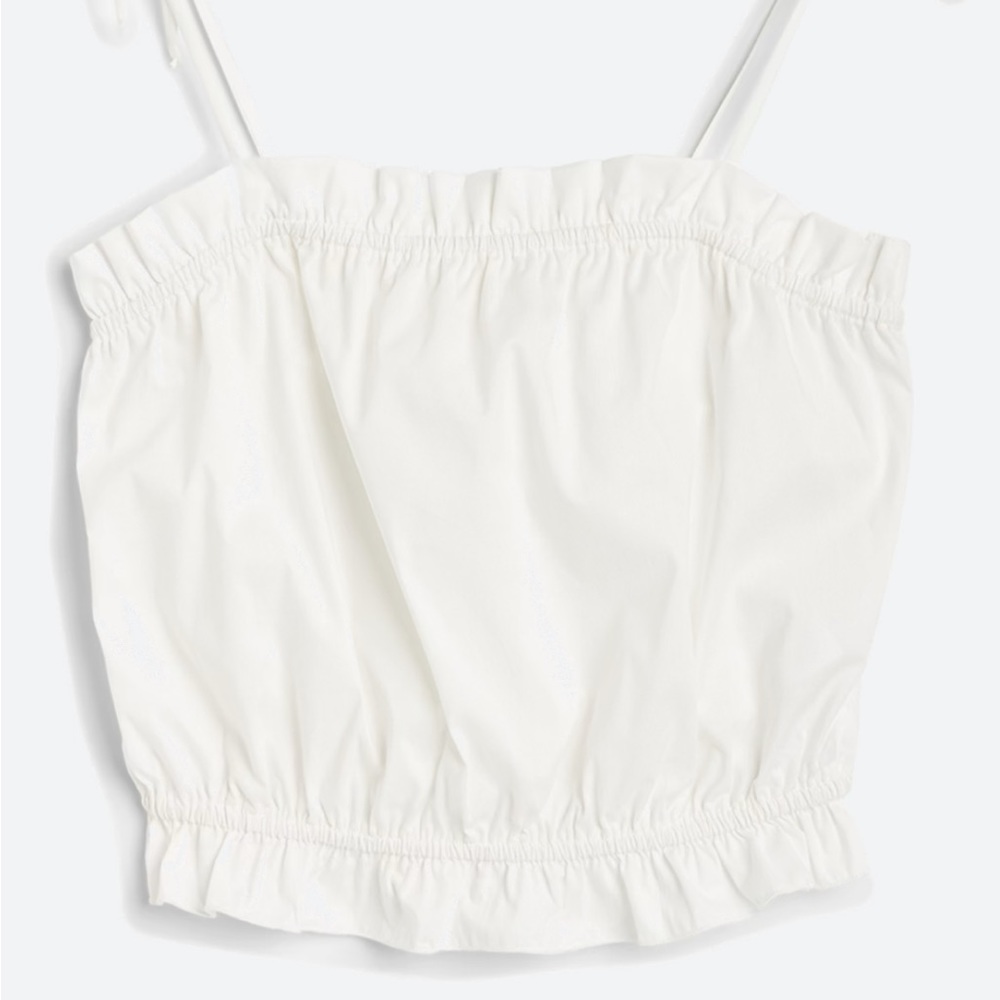 Never been worn cropped Cami 97% cotton, 3% spandex.